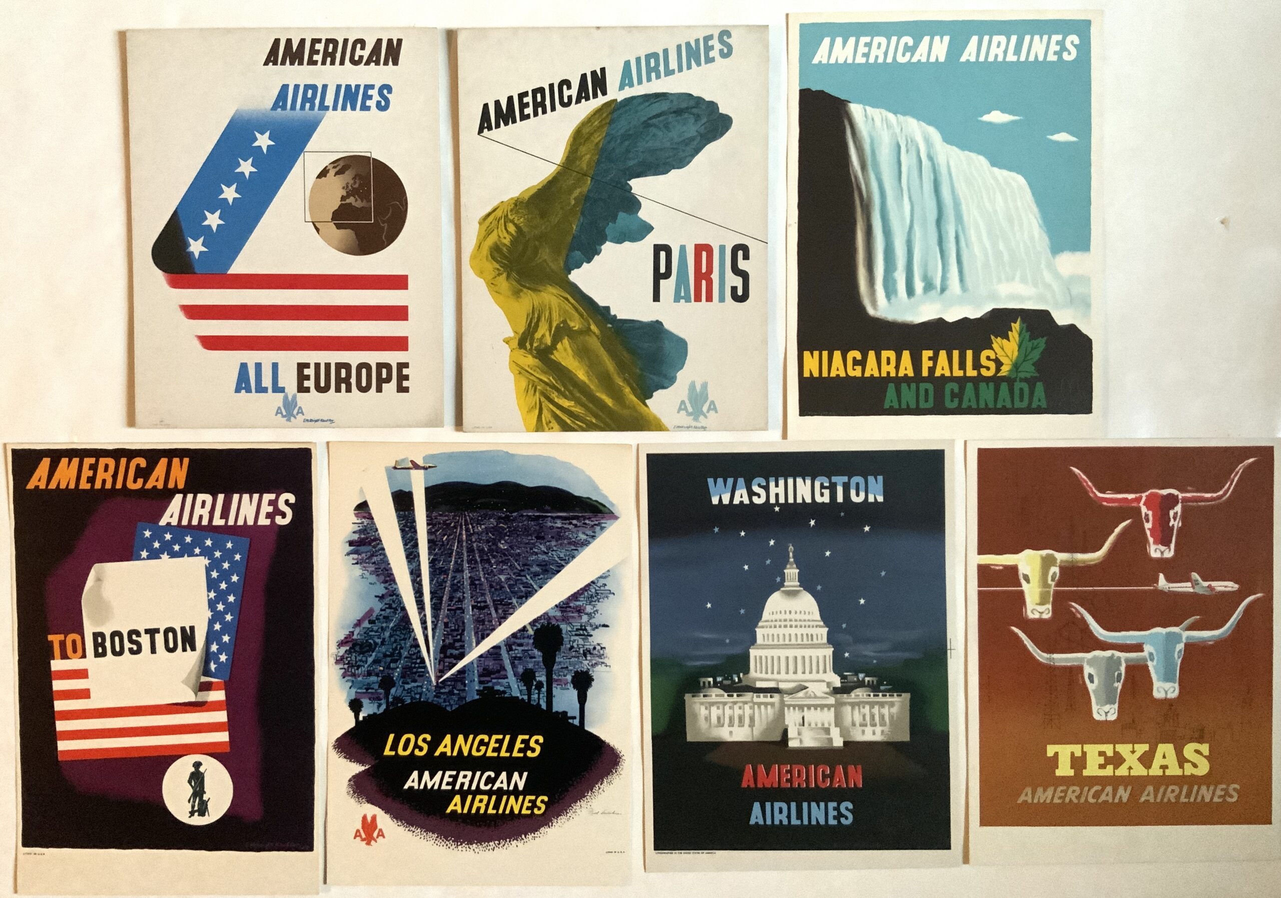 M421	CA. 1950S GROUPING OF 6 SIGNED AMERICAN AIRLINES MINI POSTERS INCLUDING 4 BY E.M. KAUFFER, 2 OF WHICH ARE UNUSED STANDEES